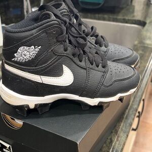 Jordan Kids Black and White High-Top Cleats size 1Y